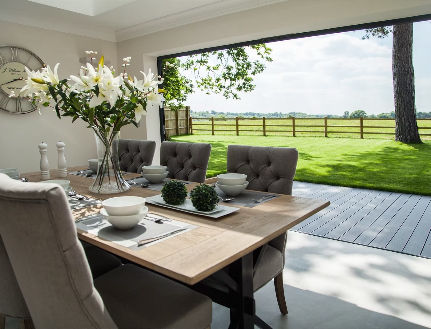 Dining room opening onto the garden and paddock beyond